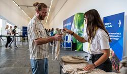 Volunteer handing out bags